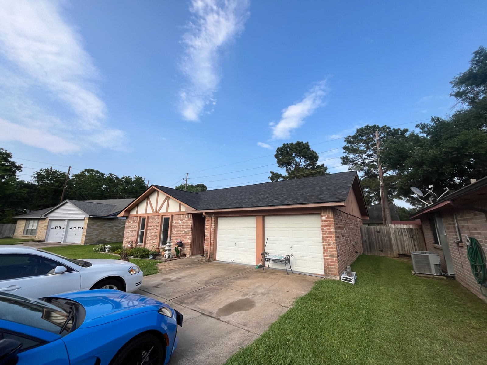 Completed dark shingle roof on a Houston-area home